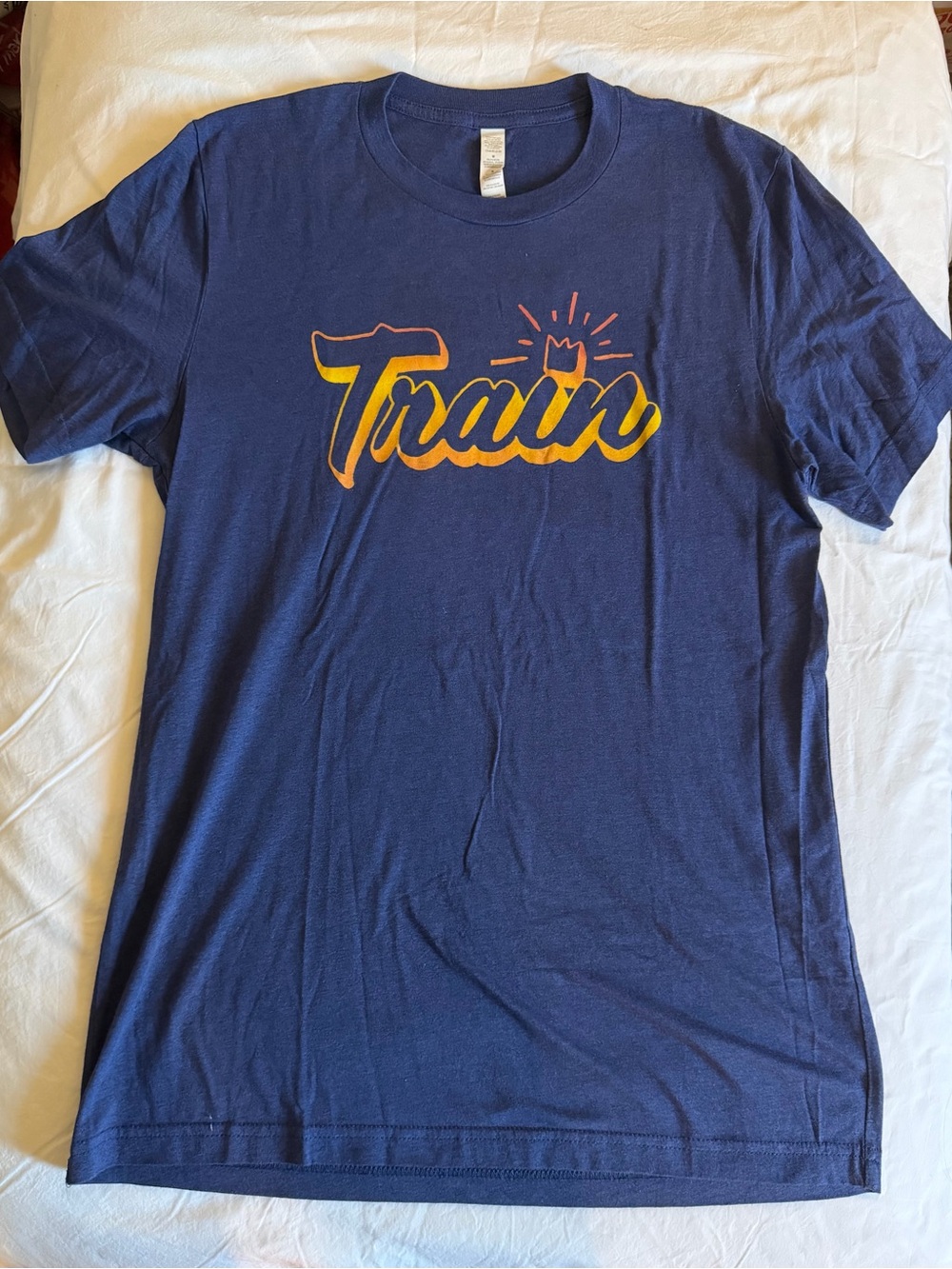 Women’s Bella Canvas Blue T-Shirt with Yellow & Orange 'Train' Graphic